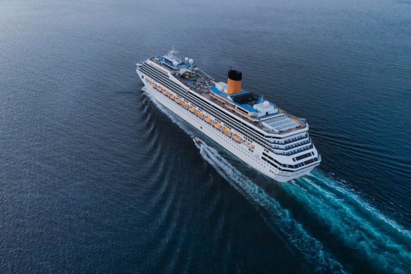 Aerial view of beautiful white cruise ship above luxury cruise concept tourism travel on holiday vacation time.